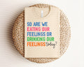 Eating or Drinking Our Feelings Graphic Tee product image 1